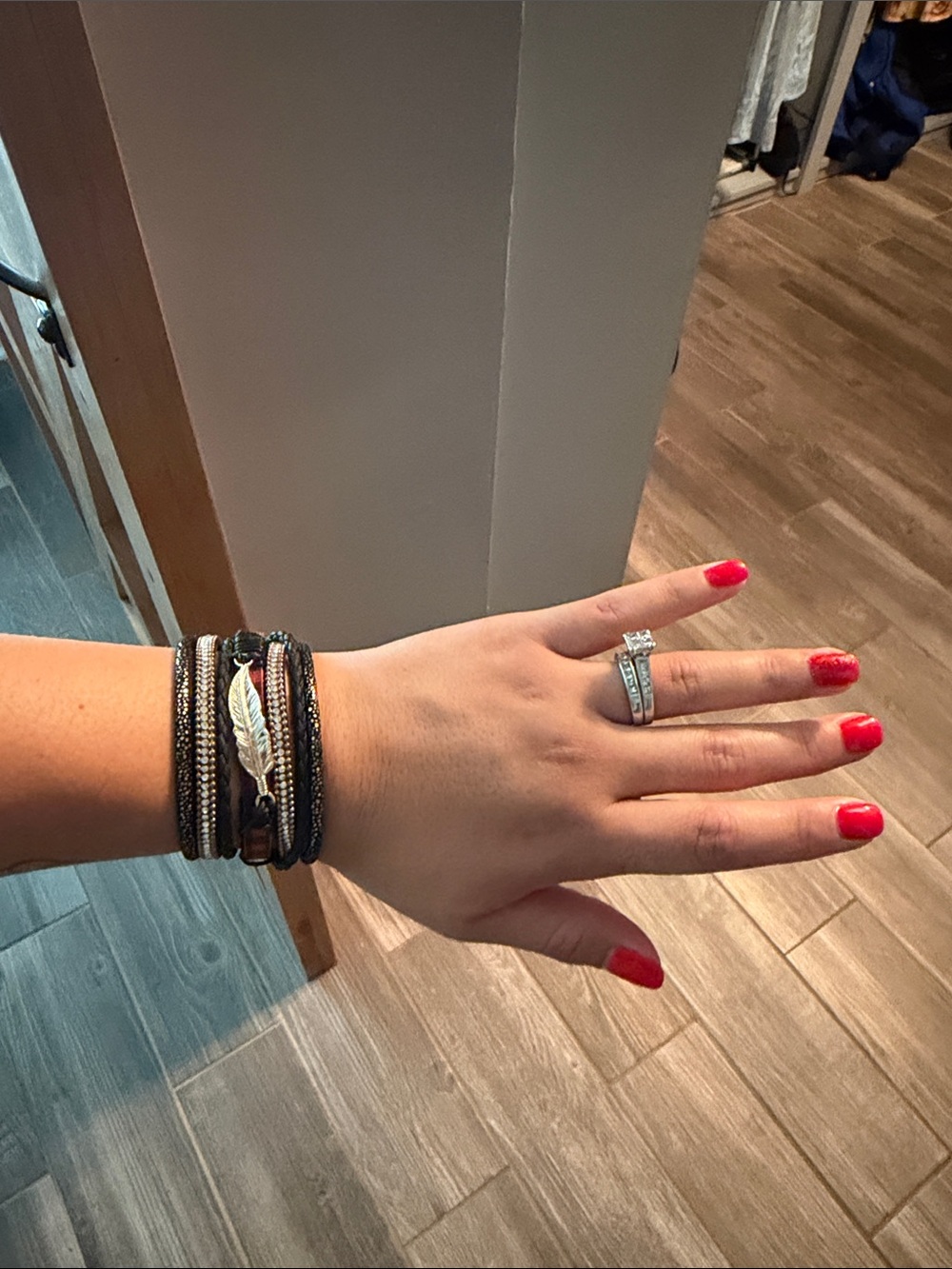 Layered Leather Wrap Bracelet with Feather Accent - Black and Red